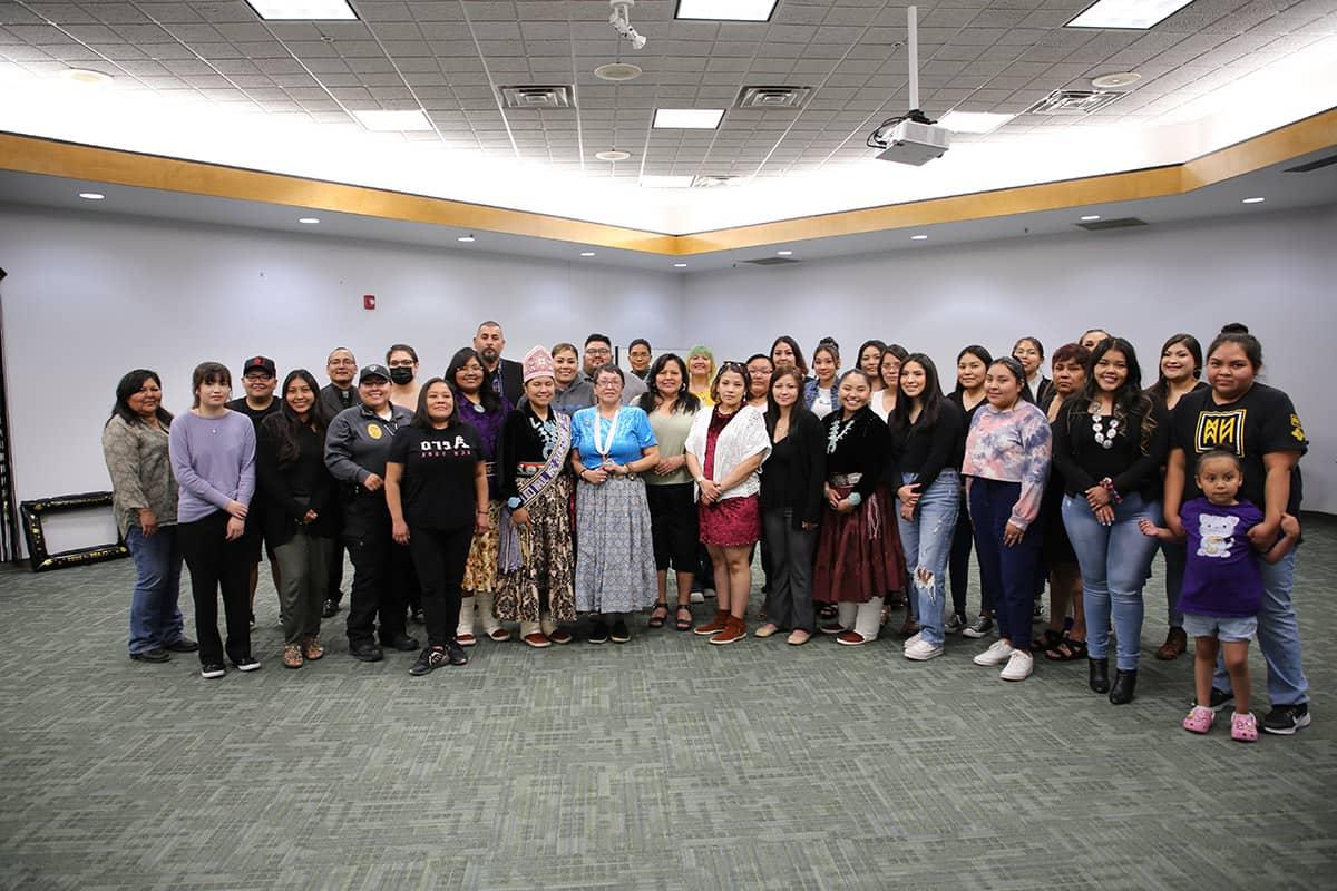 group photo of recent Native American graduates after a reception for the Native American Center